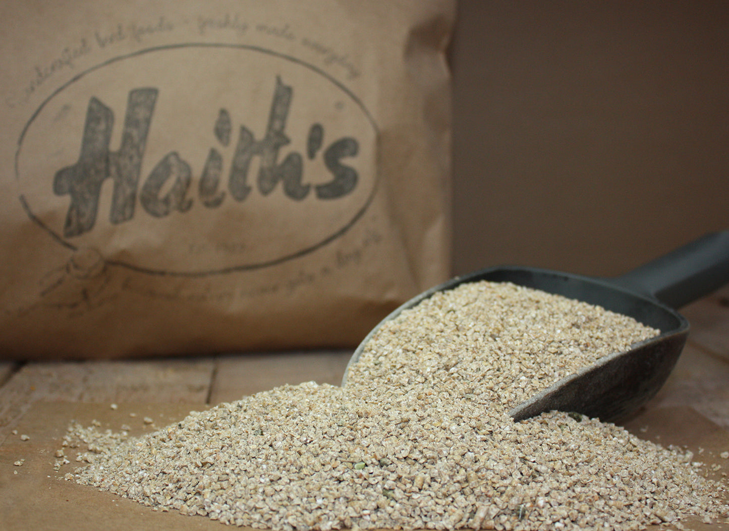 Haith's high protein crumbs for fishing inside a scoop