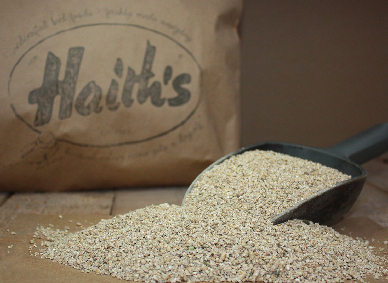 Haith's high protein crumbs for fishing inside a scoop 